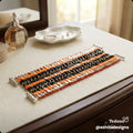 Orange and gold tila bead bracelet